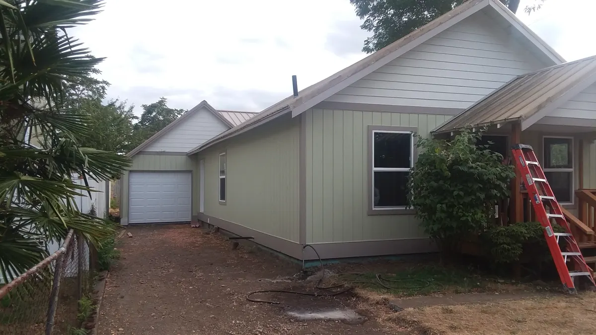 House with new roofing and siding in Salem Oregon